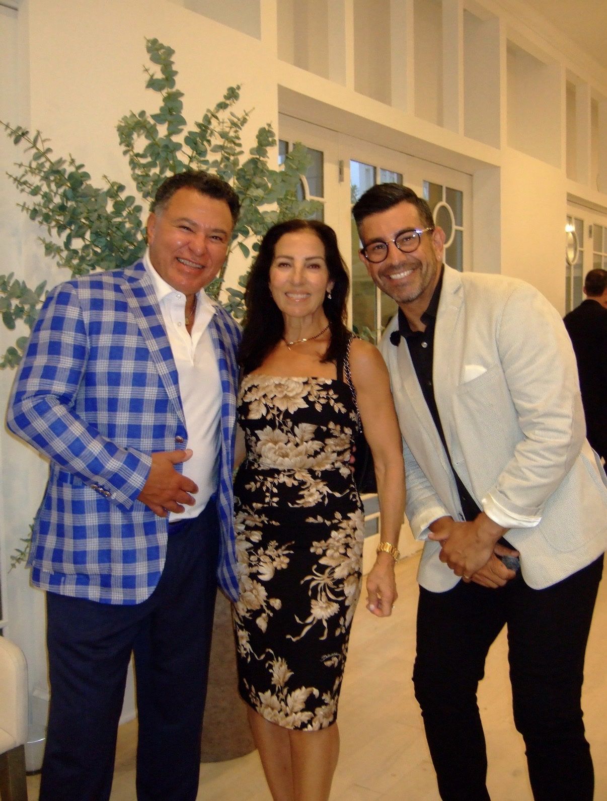 Richie Hosein with Dr. DeMoura at an evening event in the Hamptons