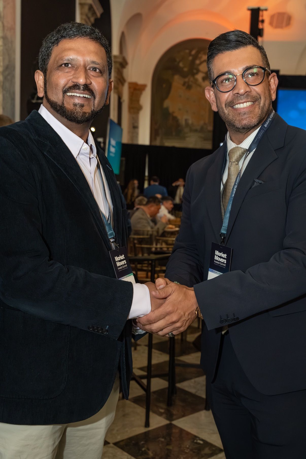 Richie Hosein shaking hands with Dr. Quadri of the Hackensack hospital system and founder of Grow360 Fund at the Market Movers Investor Summit