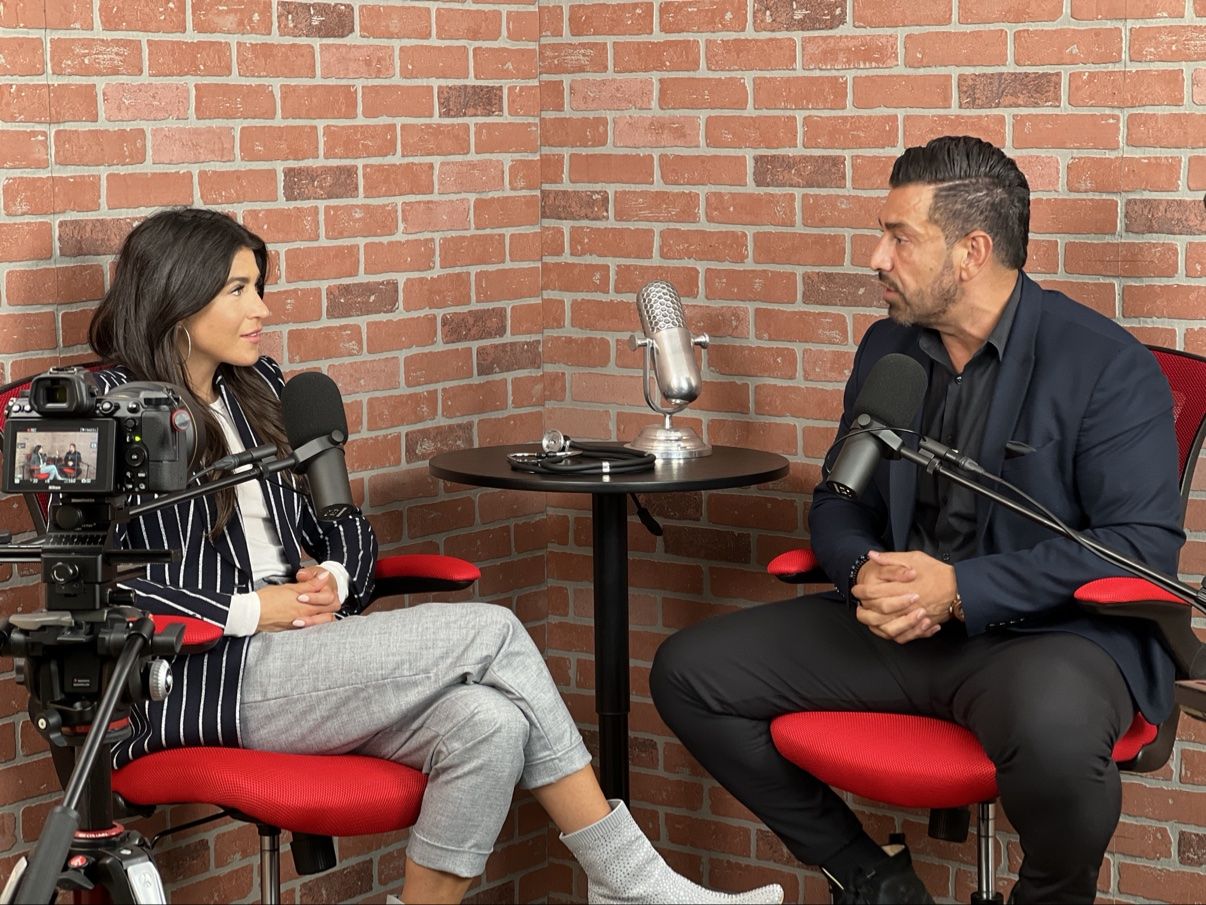 Richie Hosein recording a podcast interview with host Skye Ostreicher